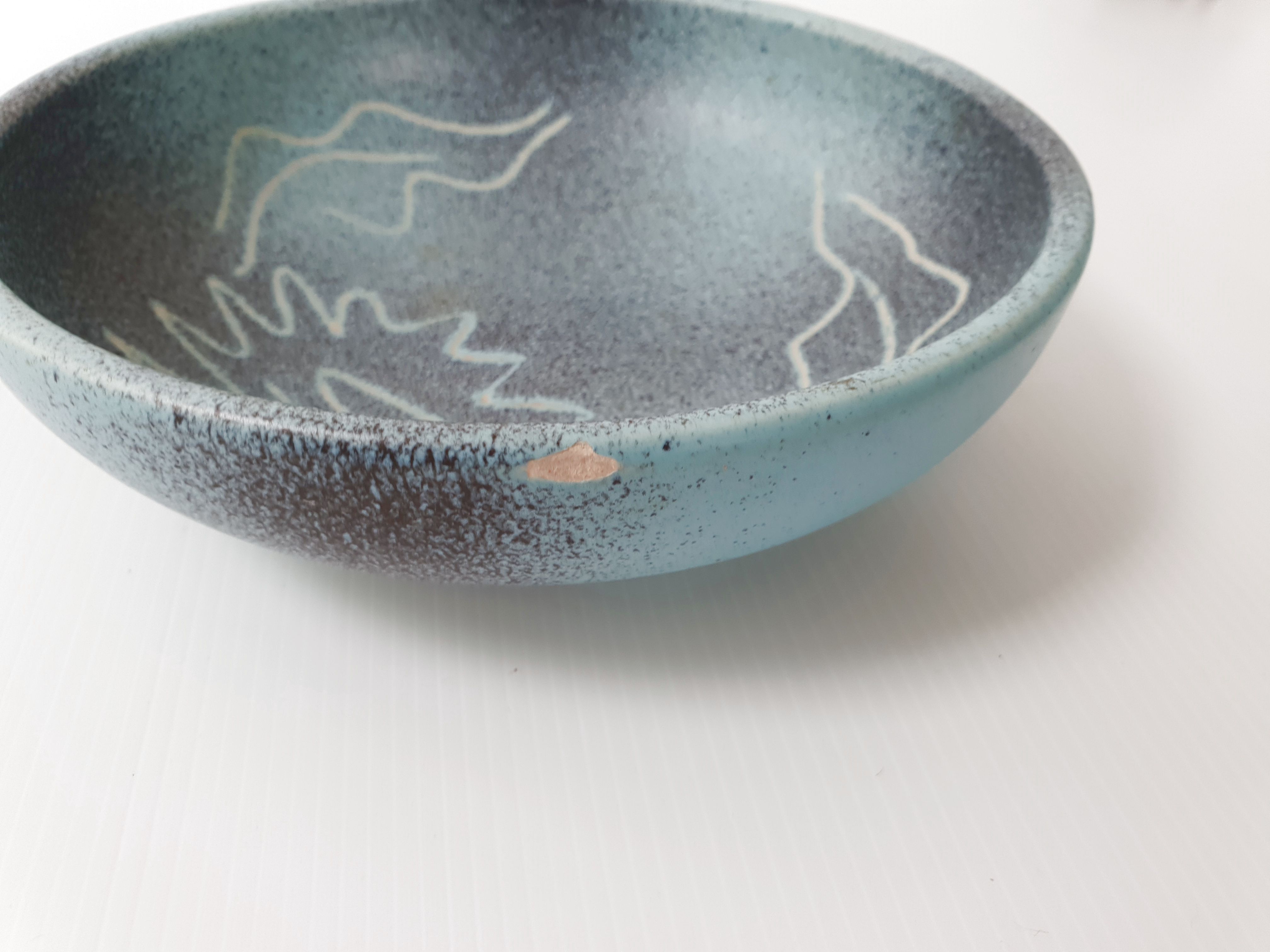 Cuts the 2 vintage Norman potters 1960