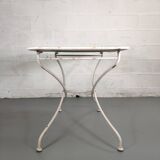 Ancienne table de jardin pliante en fer forgé blanche