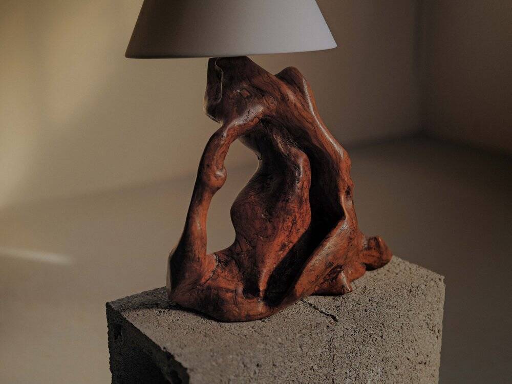 Sculptural lamp made of olive wood, around 1960.