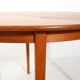 Round extendable teak table by Svante Skogh