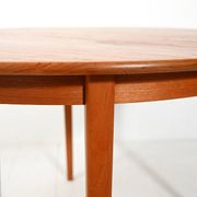 Round extendable teak table by Svante Skogh