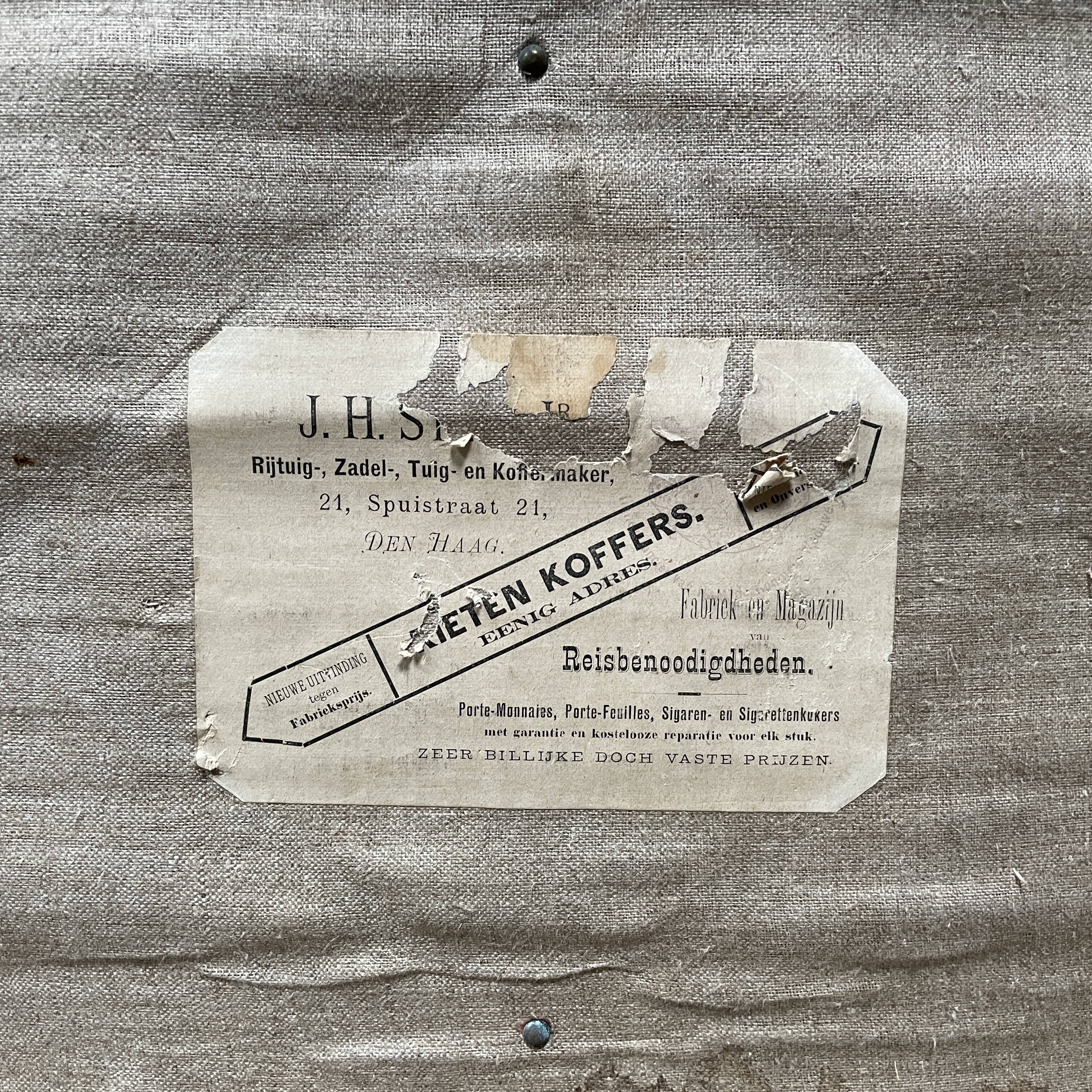 Antique brown travel case with wooden slides from the early 1900s