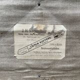 Antique brown travel case with wooden slides from the early 1900s