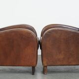 2 fauteuils en cuir de mouton