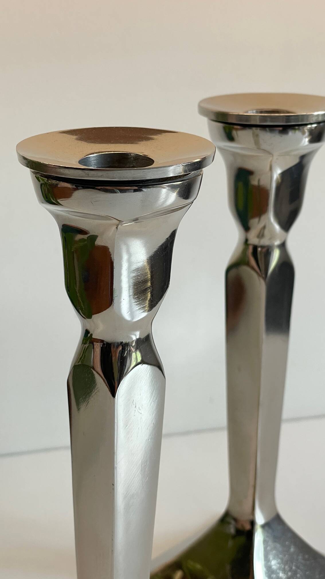 Pair of vintage cast aluminum candlesticks