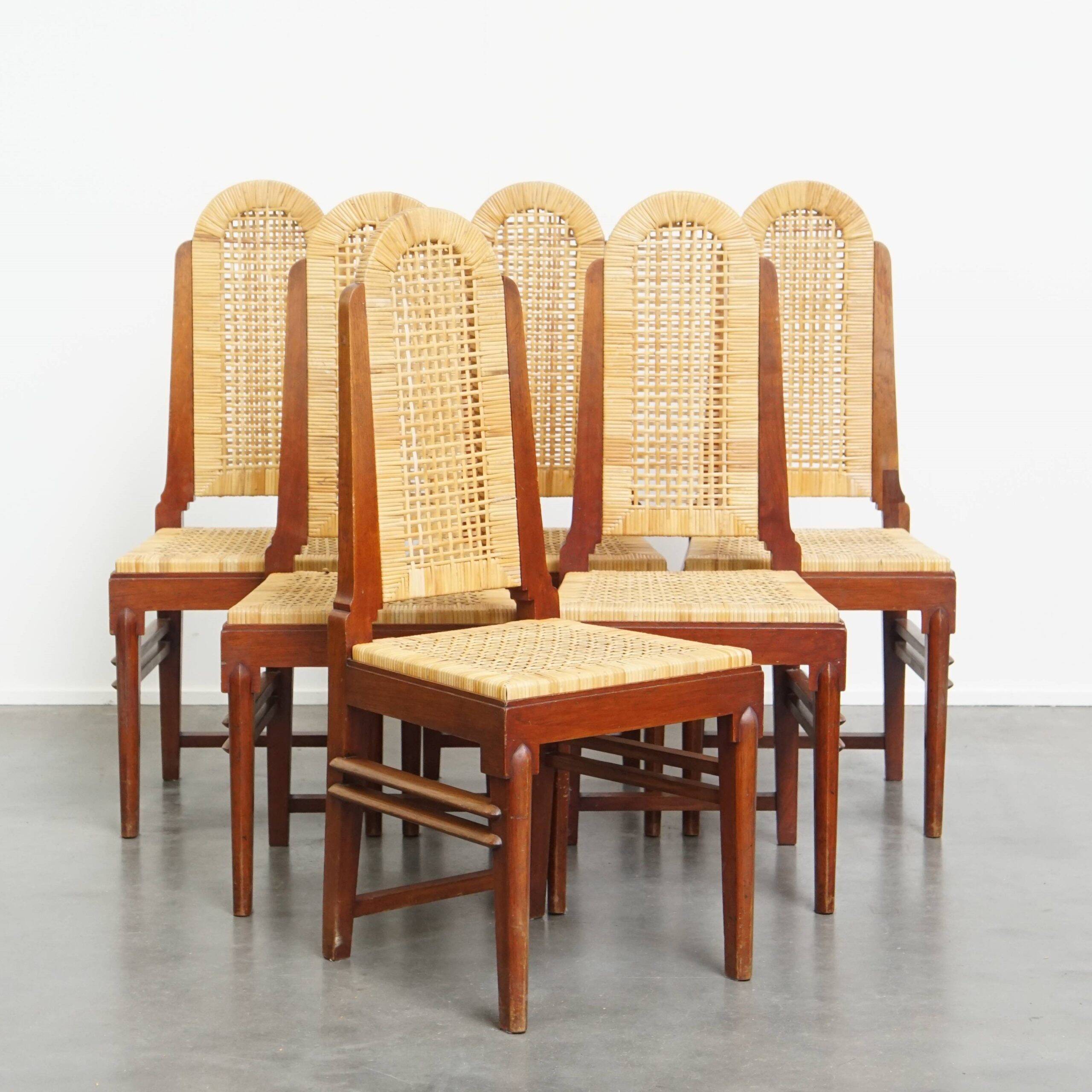 et of 6 wooden Art Deco design dining chairs with a wicker seat and backrest
