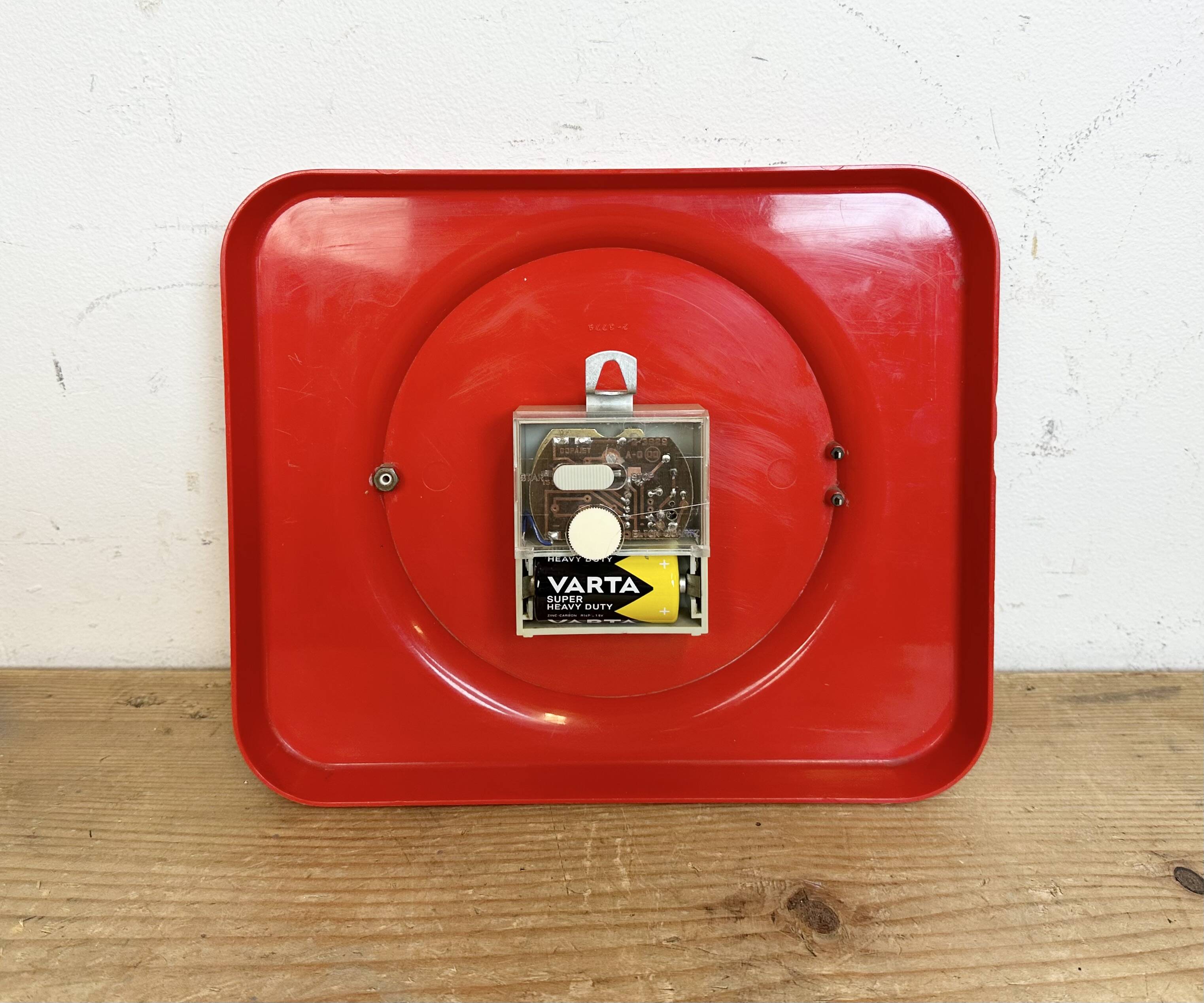 Vintage red bakelite wall clock from prim, 1970s