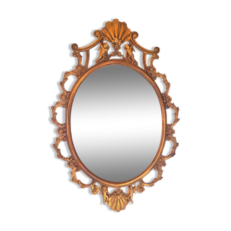 Baroque mirror in gilded brass