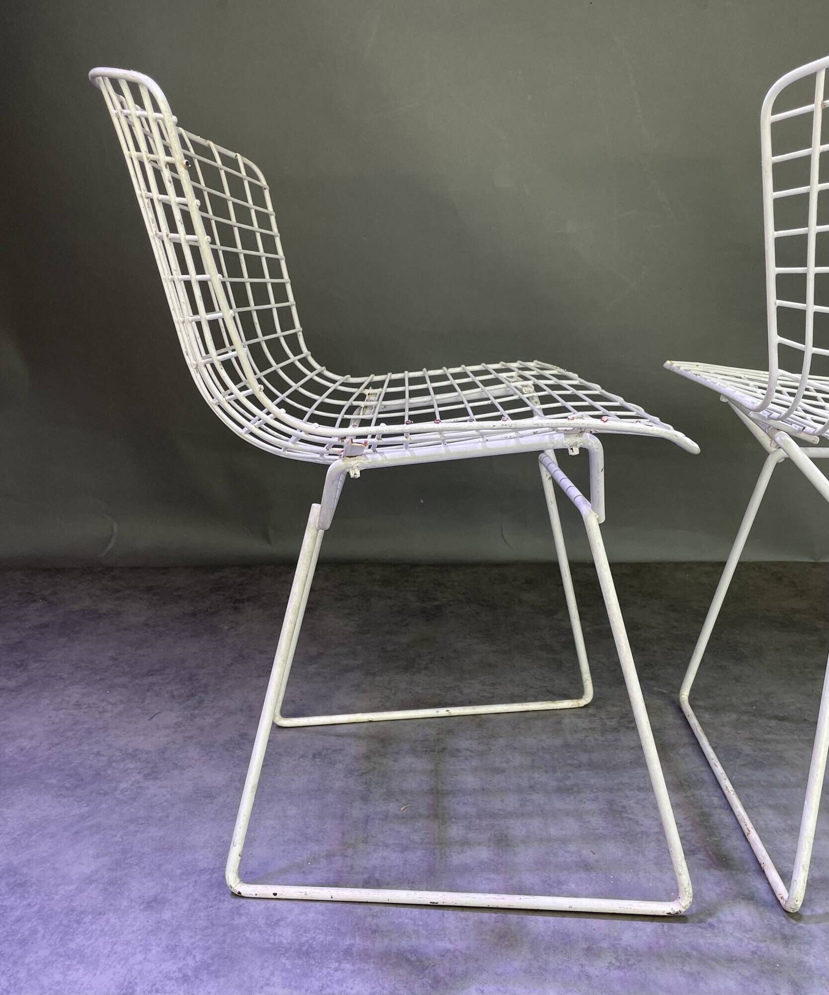 Pair of white lacquered Bertoia chairs