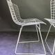 Pair of white lacquered Bertoia chairs