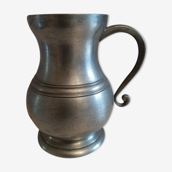 Tin pitcher with handle and spout