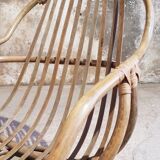 Antique swivel rattan armchair