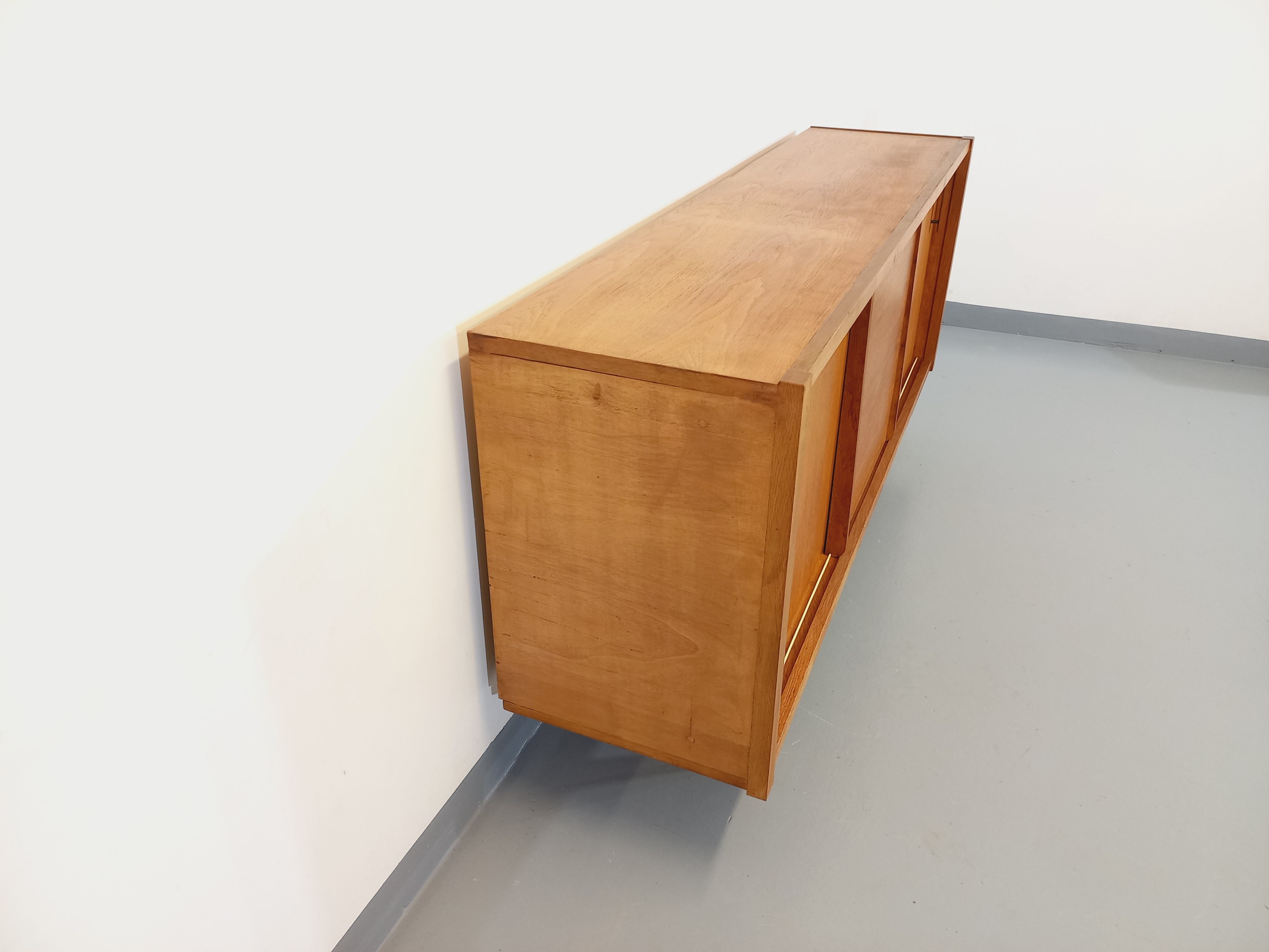 Vintage row in light oak wood from the 60s