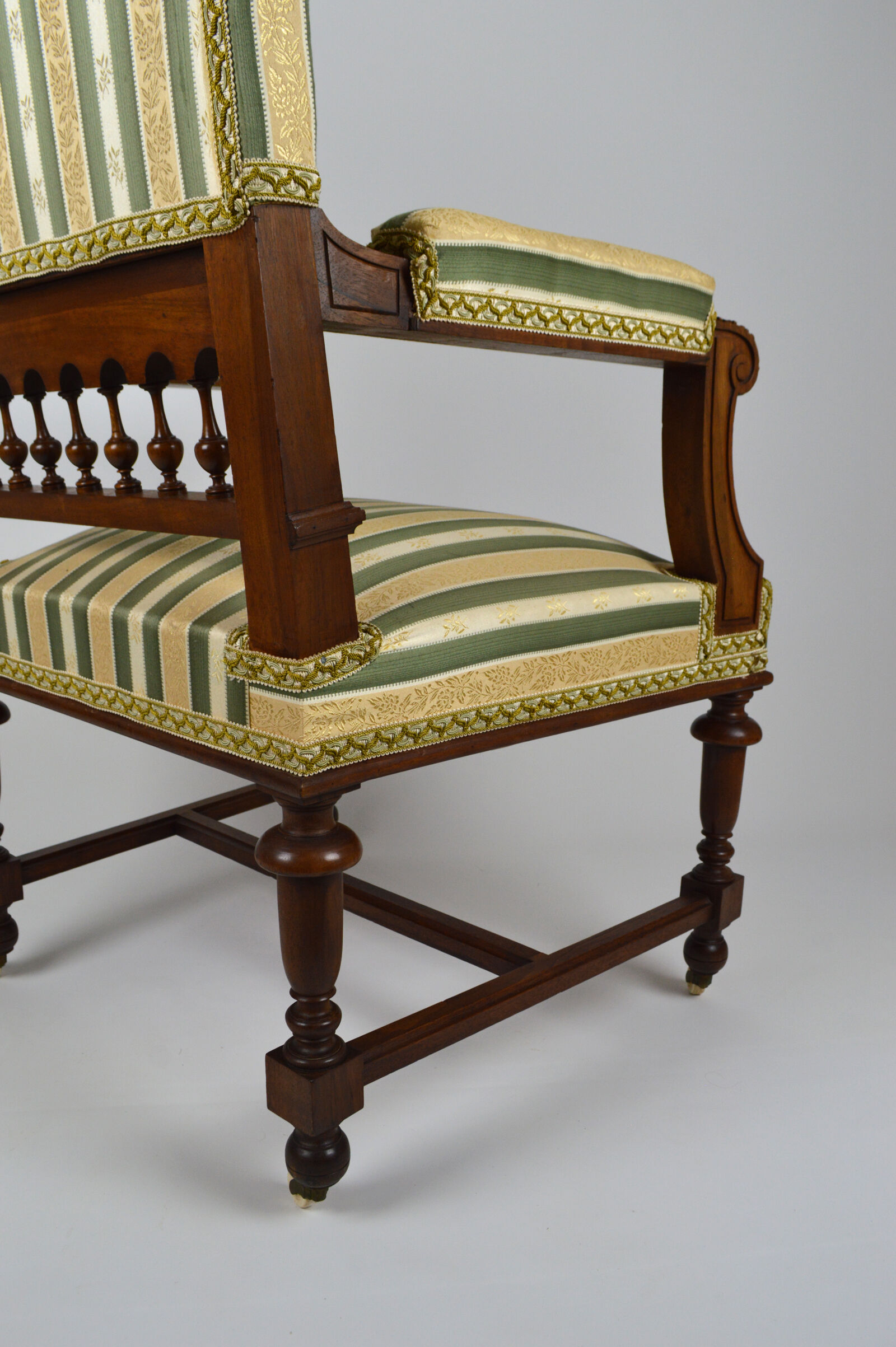 Neo-Renaissance walnut armchair with lion heads, circa 1880
