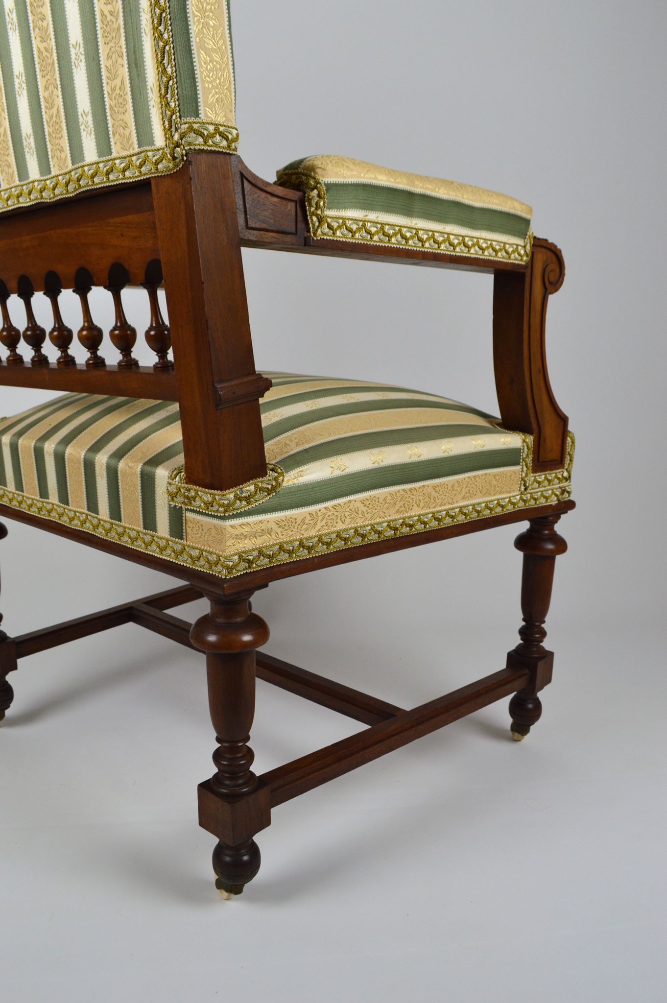 Neo-Renaissance walnut armchair with lion heads, circa 1880