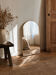 Contemporary Scandinavian mirror in gold metal with rounded corners.