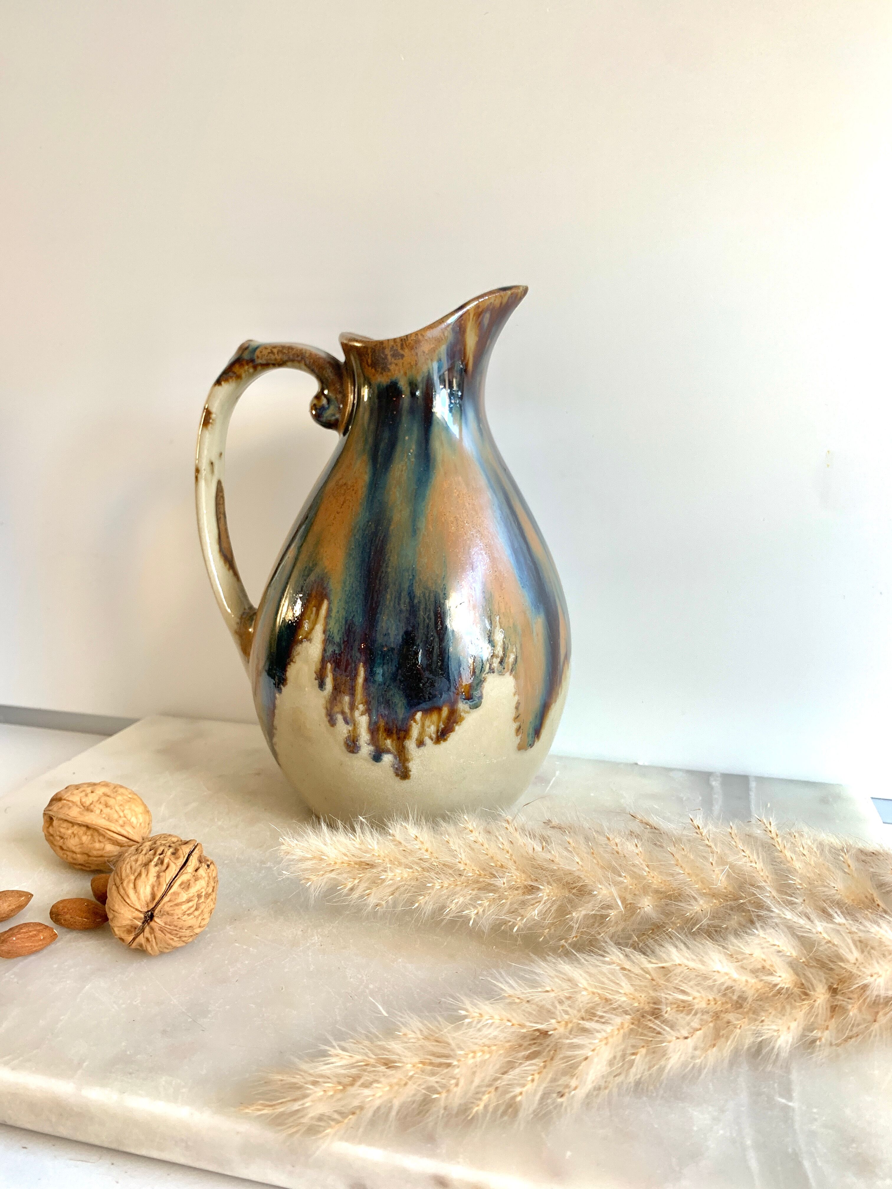 Pitcher in flamed sandstone