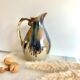 Pitcher in flamed sandstone