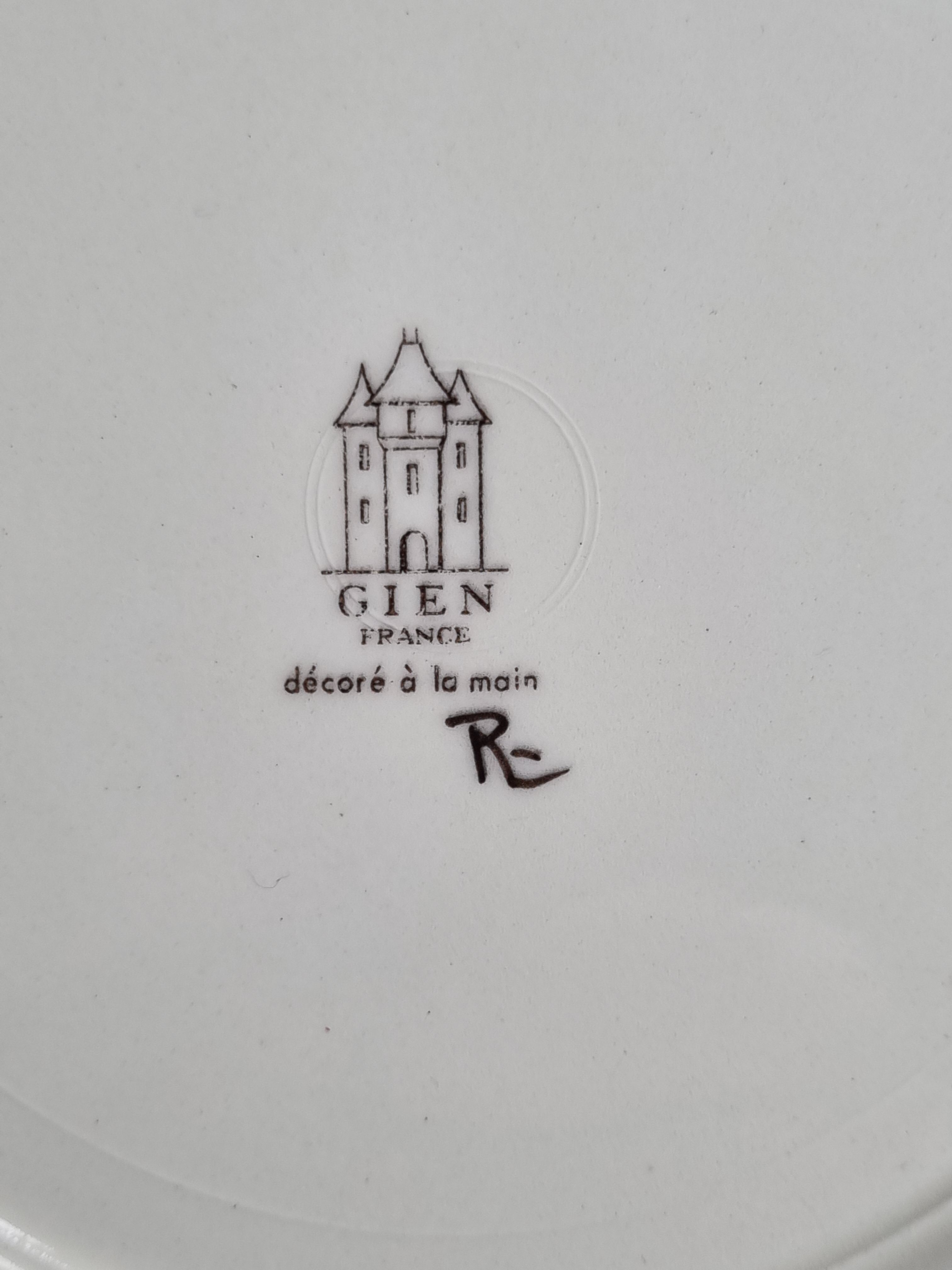 Plate in gien earthenware model rambouillet "couple of pheasants" signed in the décor, 26 cm