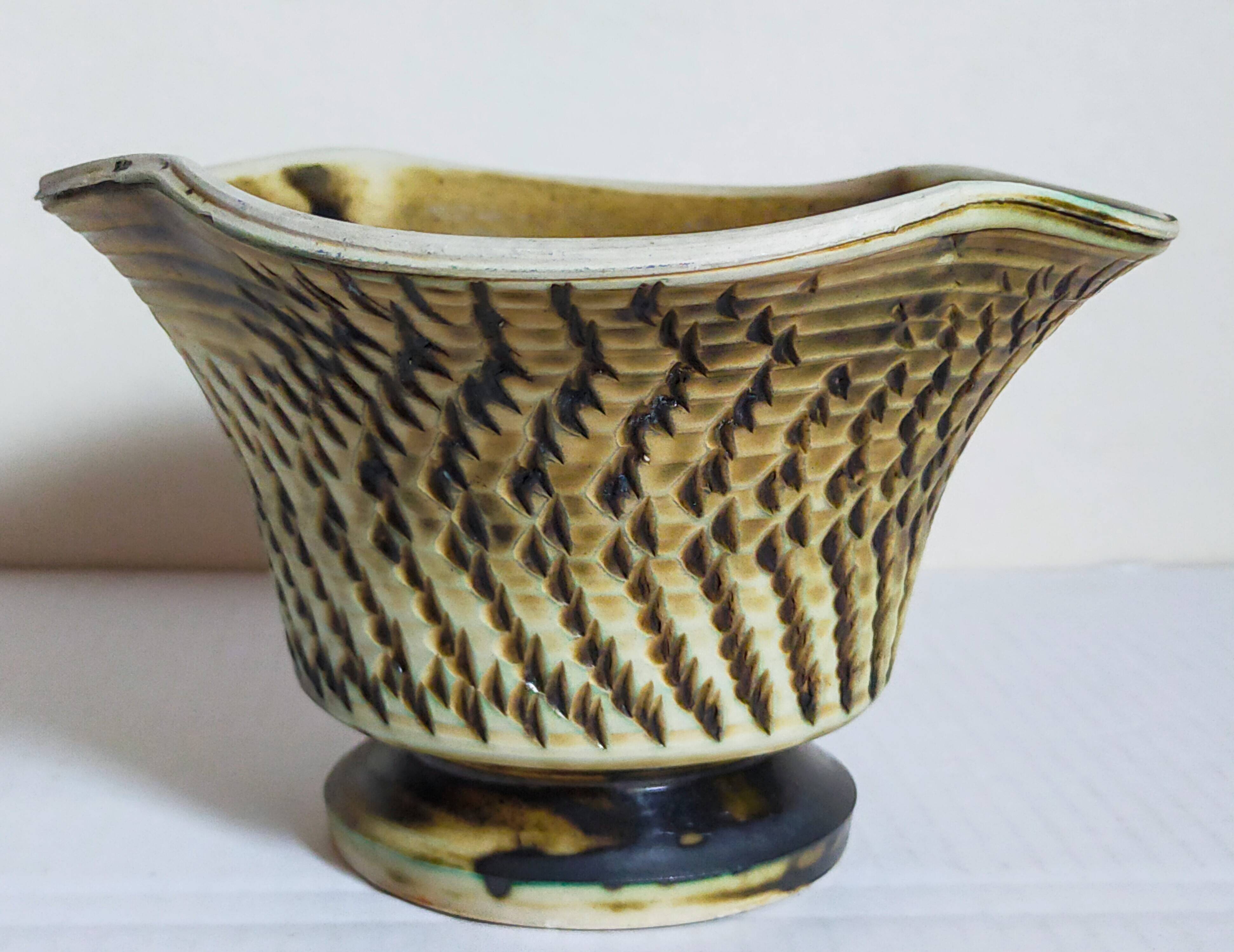 Ceramic planter with vintage scarifications from the 1950s