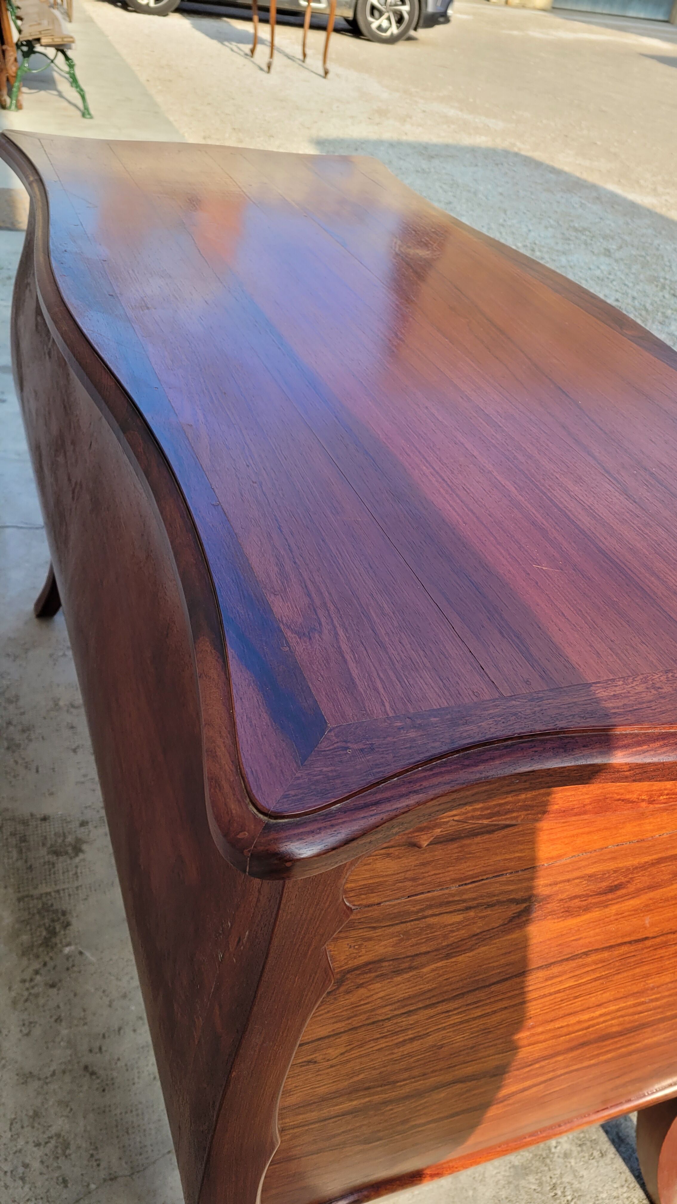 Curved Louis XV style commode in mahogany.