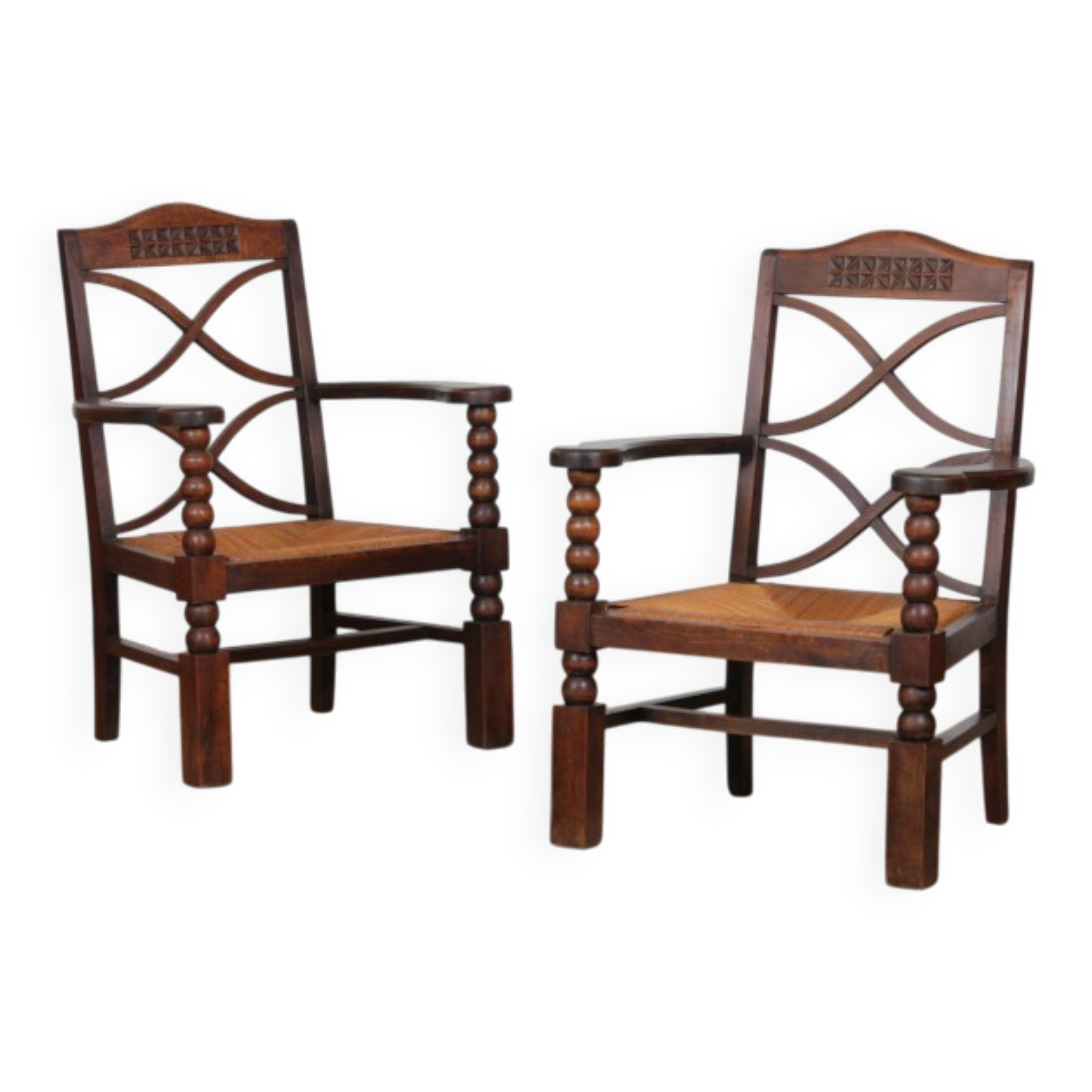 Pair of armchairs in the style of Charles Dudouyt, 1950.