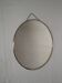 Miroir rond barbier avec chainette des années 50