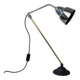 Old articulated industrial workshop lamp