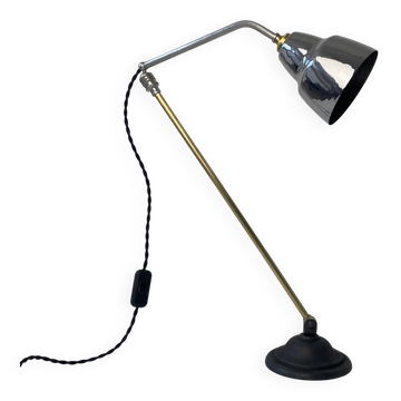 Old articulated industrial workshop lamp