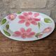 Oval serving dish with hand-painted pink flowers in San Marciano ceramic.