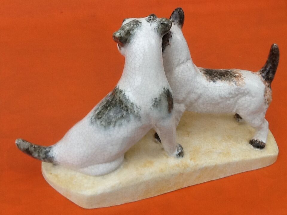 Zoomorphic sculpture cracked ceramic fox terrier dogs