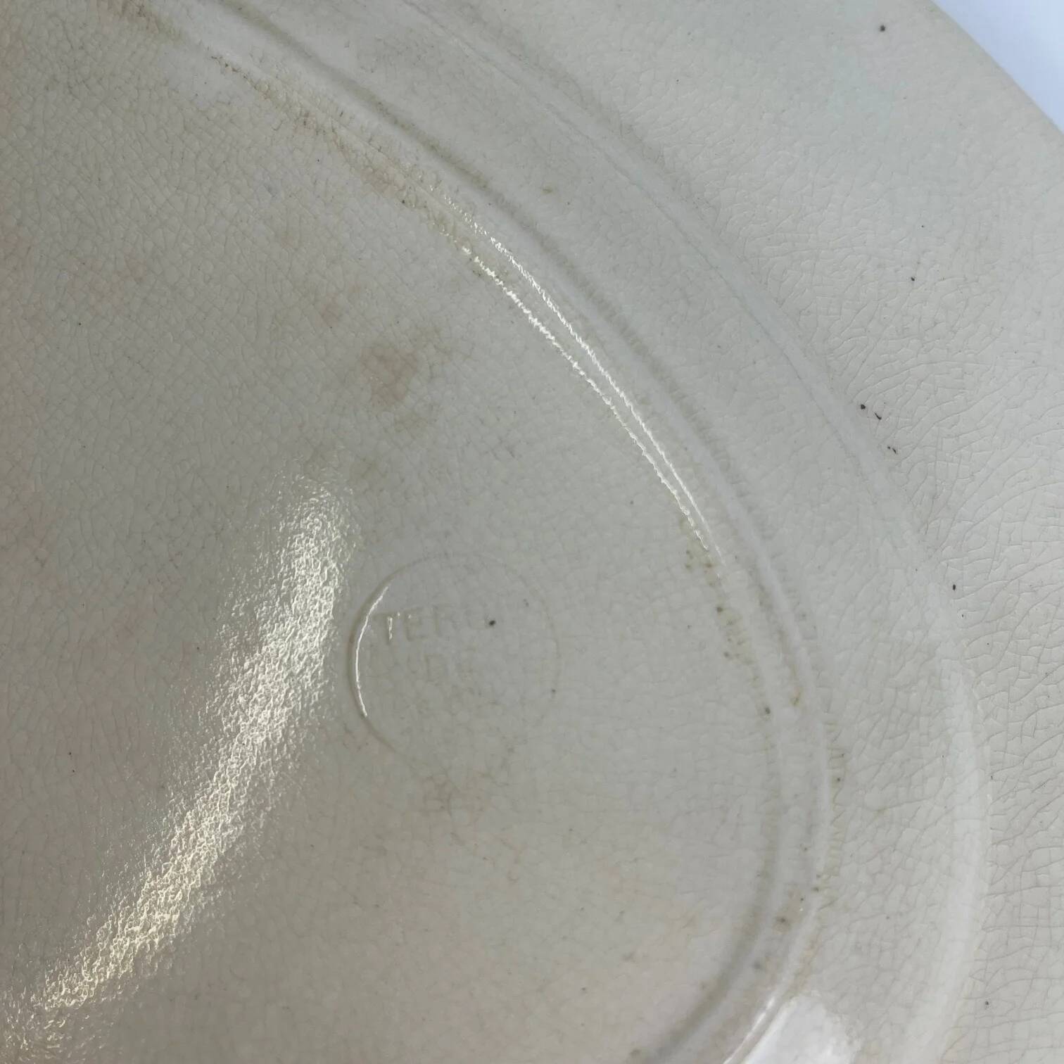 Large oval ironstone dish, "Damas" pattern by Sarreguemines, late 19th century, grey-black.
