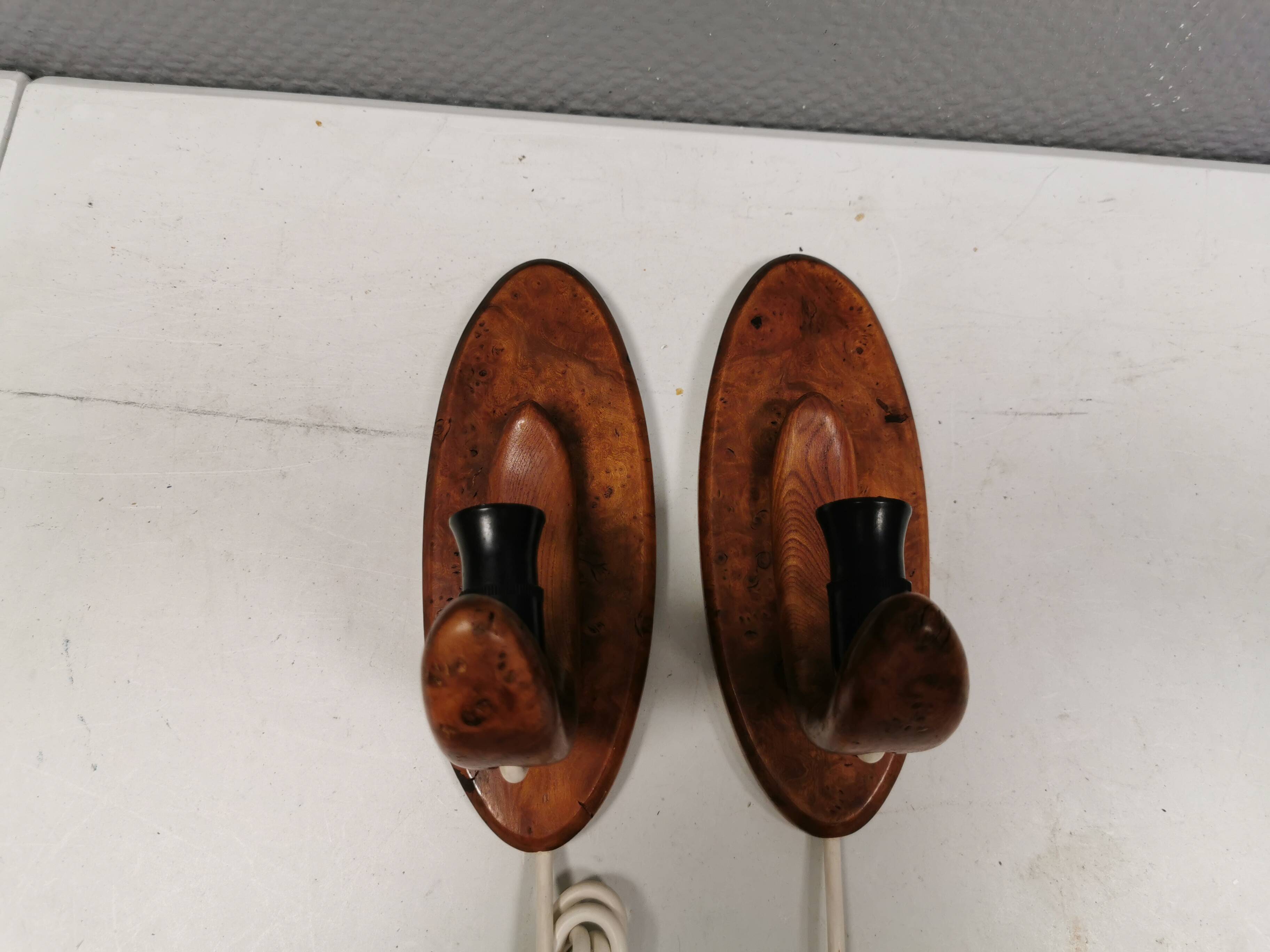 A set of old wall lamps in walnut.