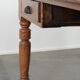 Antique writing table / partner desk with 4 drawers and a green leather top
