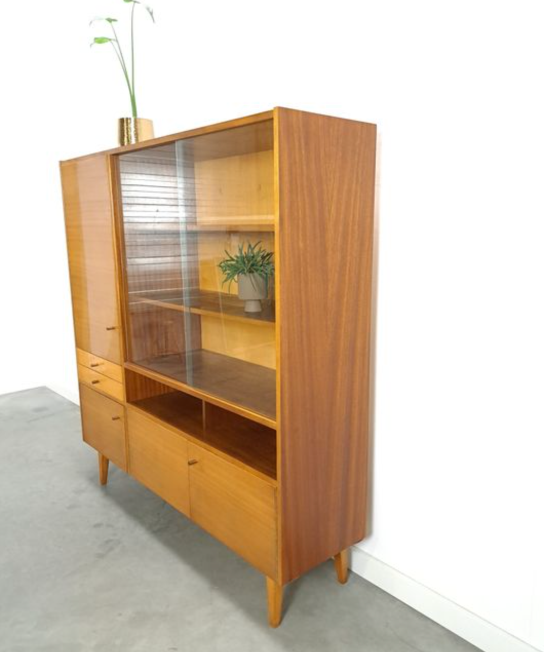 Vintage wooden sideboard with sliding glass doors and drawers