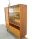 Vintage wooden sideboard with sliding glass doors and drawers