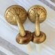 Electrified bronze gold wall sconces... in pairs.