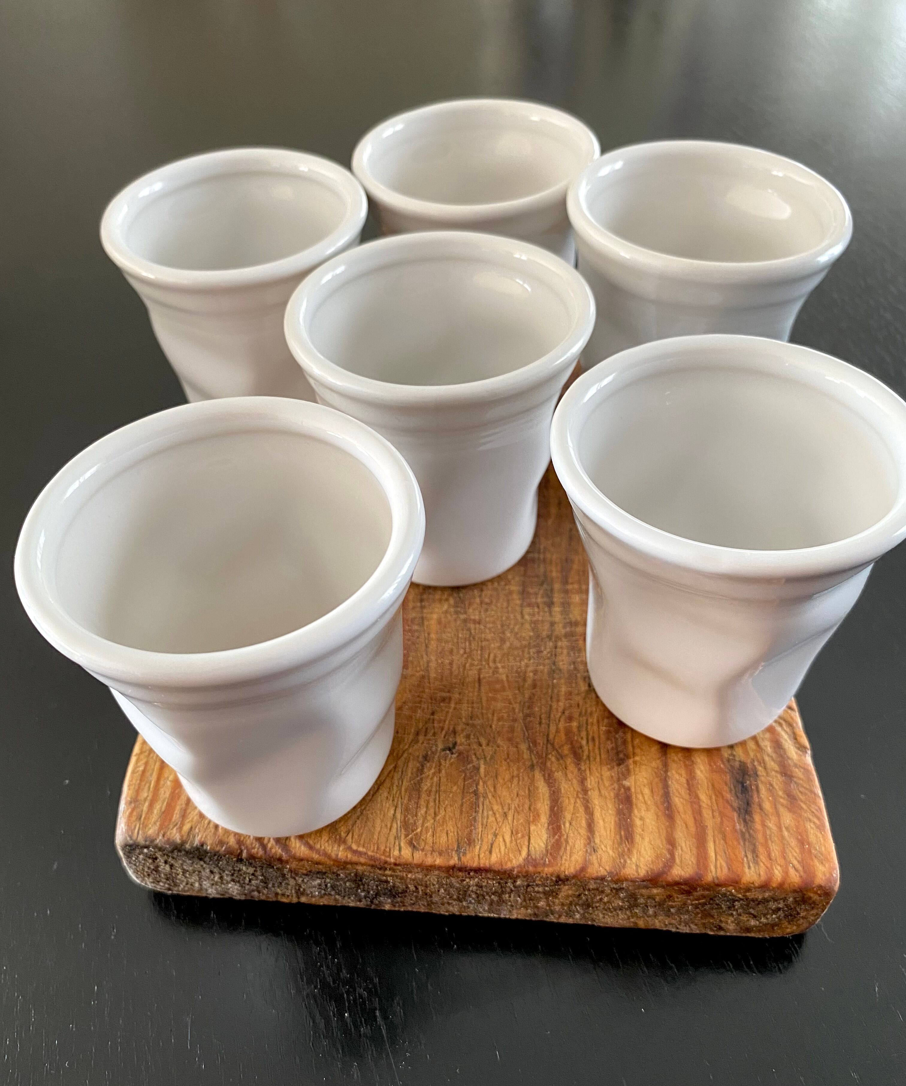 Six cups, glazed terracotta