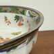 Shallow porcelain dish from Limoges Raynaud, bird decoration.