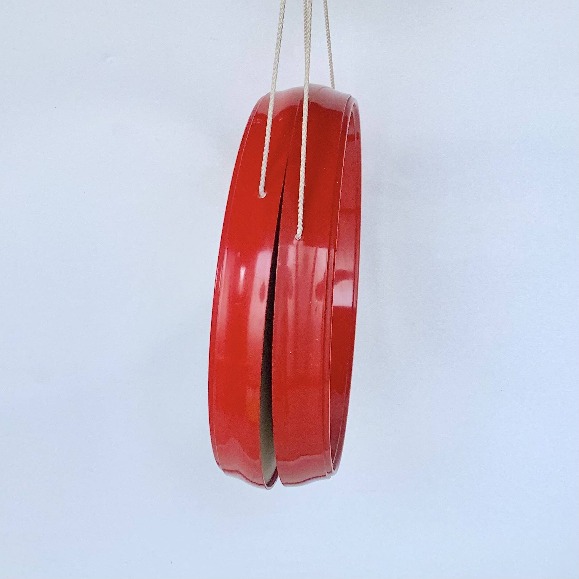 Pair of vintage round red plastic mirrors