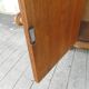 Extra furniture a door topped by a niche