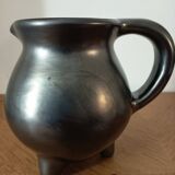 Black ceramic tripod jug