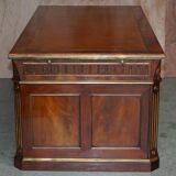 Restored antique Russian hardwood partner desk and leather armchair.