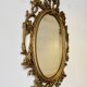 Baroque Style Oval Gold Mirror by Roberta Wood