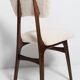 20th-century walnut and light cream boucle butterfly chair, Europe, 1960.