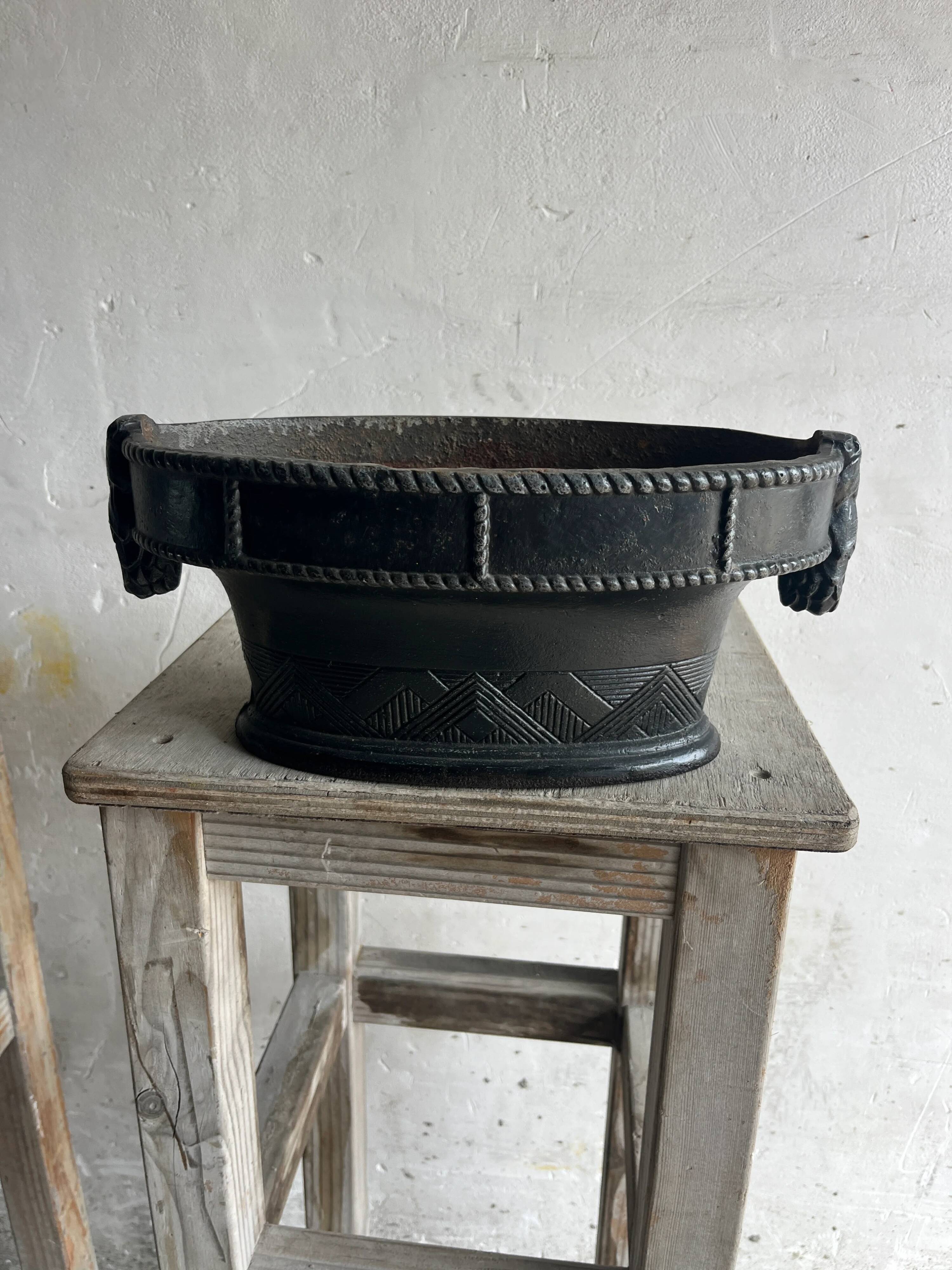 Pair of antique cast iron planters