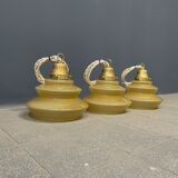 Vintage ocher glass hanging lamps with brass gallery