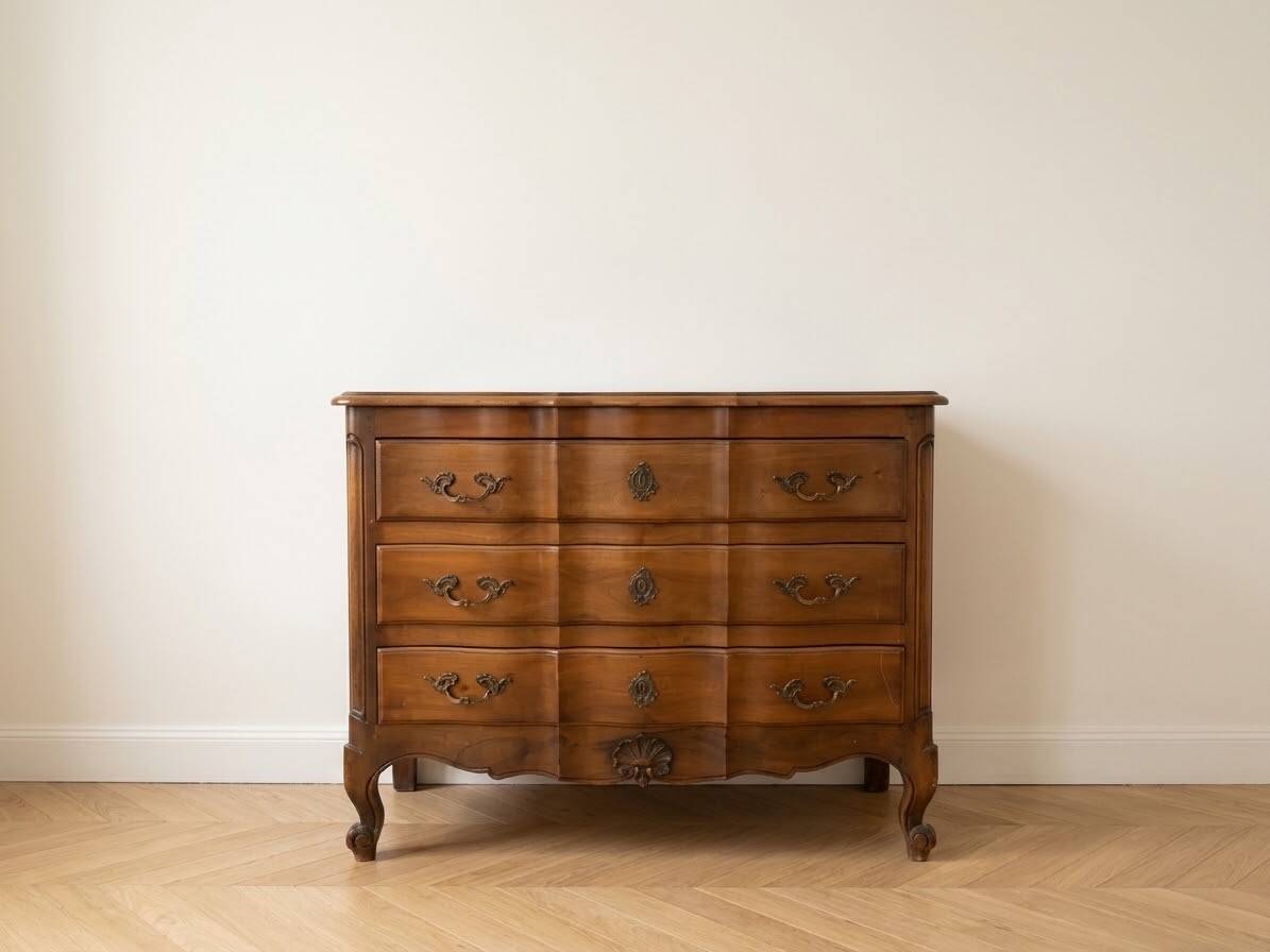 Antique curved wooden commode in classic style