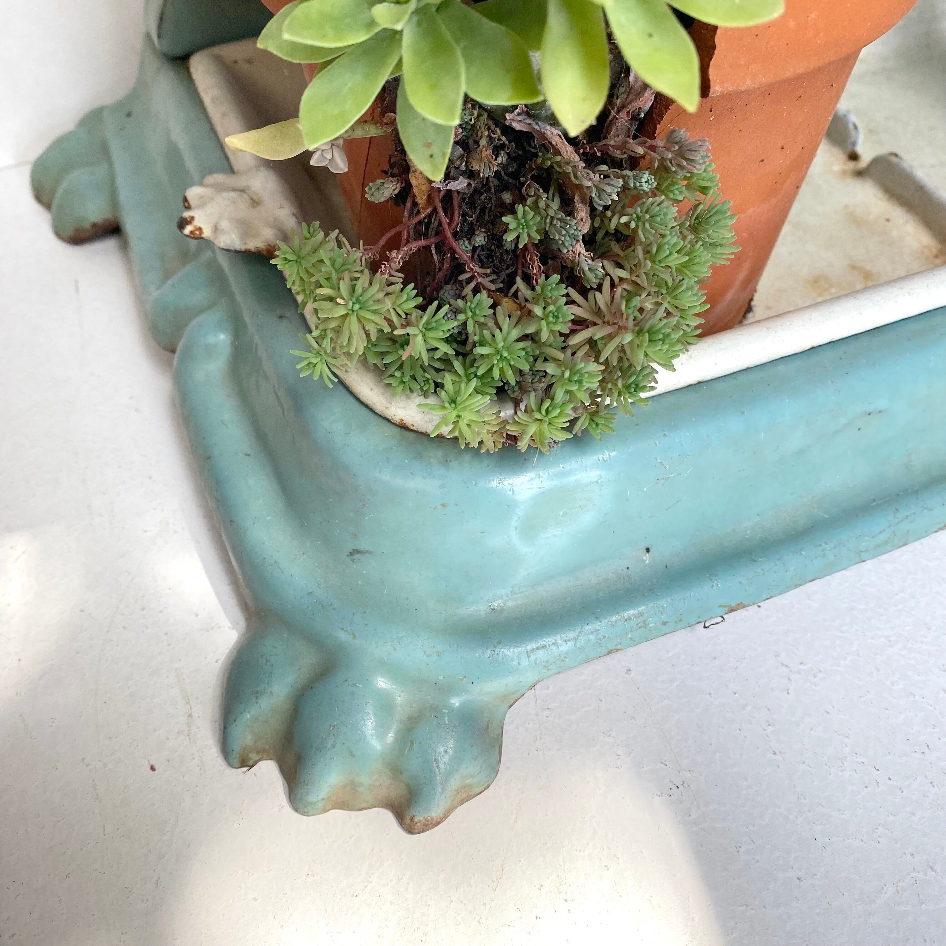 Enameled cast iron umbrella stand from the early 20th century