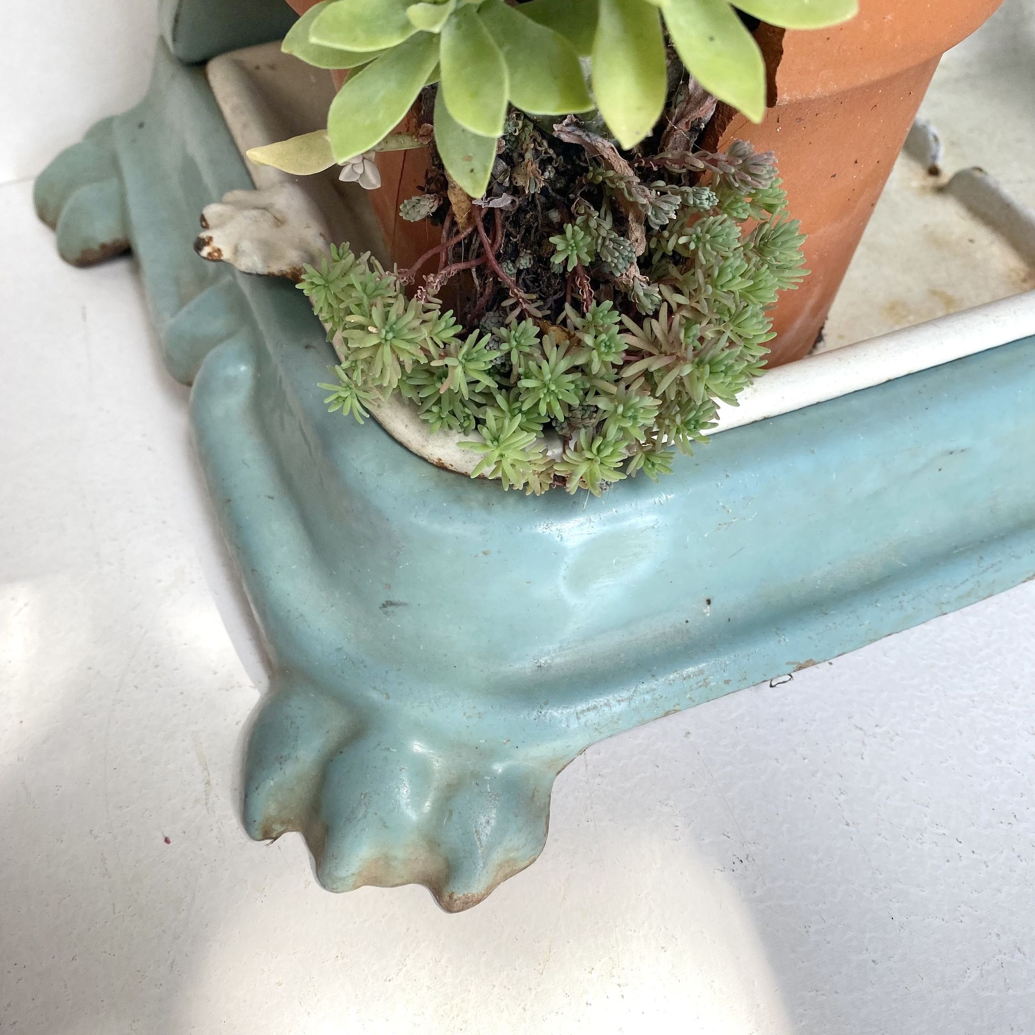 Enameled cast iron umbrella stand from the early 20th century
